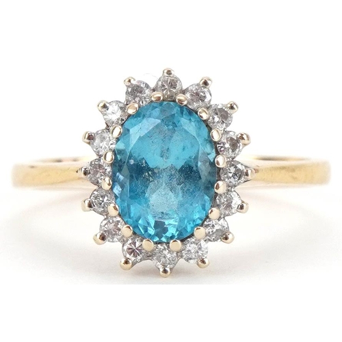 3362 - 18ct gold blue topaz and diamond cluster ring, the topaz approximately 8.10mm x 6.0mm x 4.50mm deep,... 