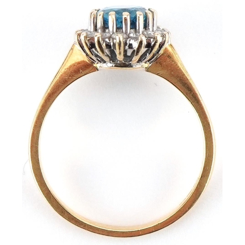 3362 - 18ct gold blue topaz and diamond cluster ring, the topaz approximately 8.10mm x 6.0mm x 4.50mm deep,... 