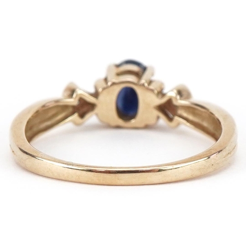 3165 - 9ct gold sapphire solitaire ring with diamond set shoulders, size N, 2.4g