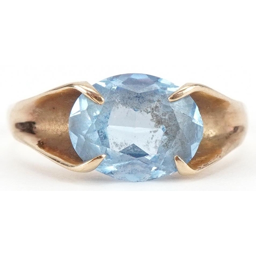 3057 - 9ct gold blue topaz solitaire ring, the topaz approximately 10.05mm x 8.05mm x 4.50mm deep, size N/O... 