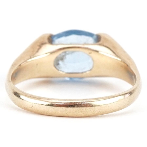 3057 - 9ct gold blue topaz solitaire ring, the topaz approximately 10.05mm x 8.05mm x 4.50mm deep, size N/O... 