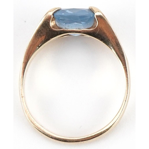 3057 - 9ct gold blue topaz solitaire ring, the topaz approximately 10.05mm x 8.05mm x 4.50mm deep, size N/O... 