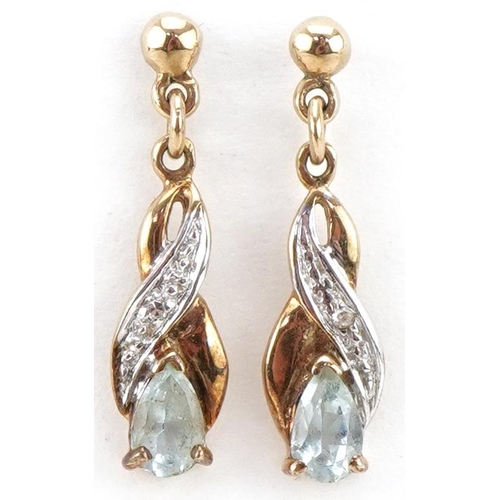 3368 - Pair of 9ct gold diamond and blue stone crossover drop earrings, each 1.9cm high, total 1.1g