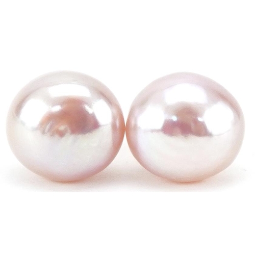 3386 - Pair of 9ct gold pink freshwater pearl stud earrings, each approximately 11mm in diameter, total 3.1... 