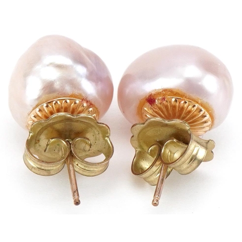 3399 - Pair of 9ct gold pink freshwater pearl stud earrings, each approximately 12mm in diameter, total 5.7... 