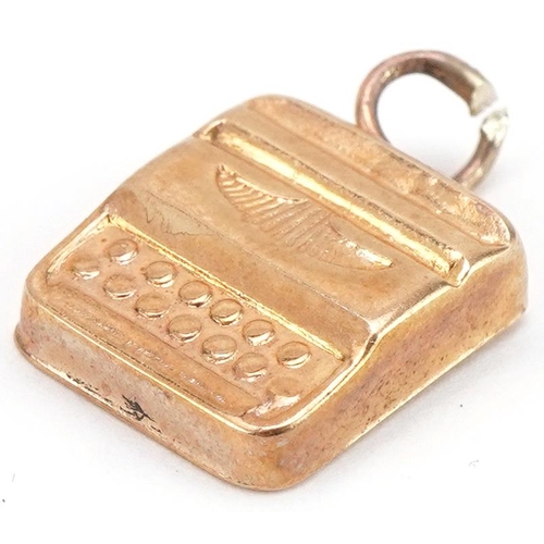 3457 - 9ct gold charm in the form of a typewriter, 1.3cm high, 0.9g