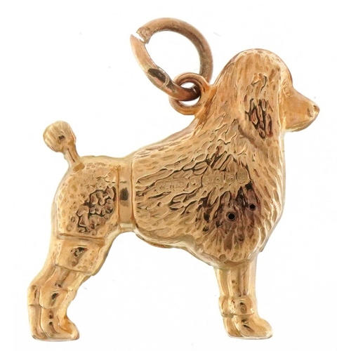 3106 - 9ct gold charm in the form of a Poodle, 1.7cm high, 0.9g