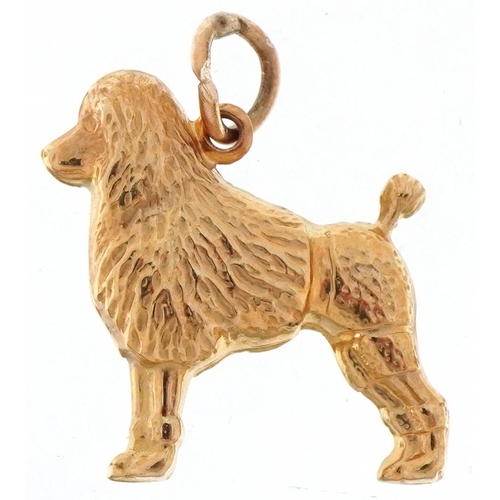 3106 - 9ct gold charm in the form of a Poodle, 1.7cm high, 0.9g