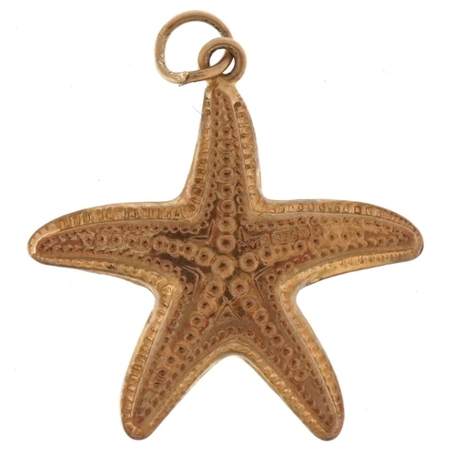 3117 - 9ct gold charm in the form of a starfish, 2.2cm high, 1.0g