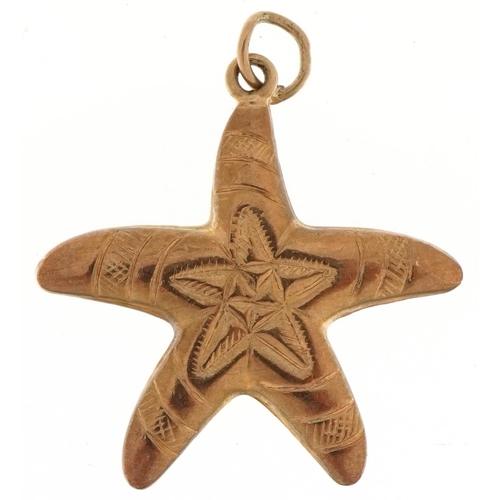 3117 - 9ct gold charm in the form of a starfish, 2.2cm high, 1.0g