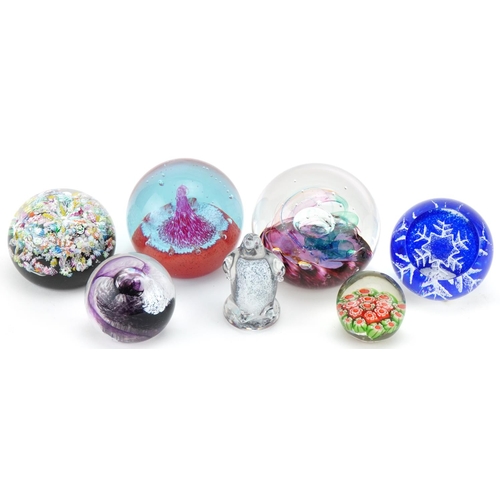 2128 - Seven colourful glass paperweights including Strathearn, Selkirk Glass and Caithness, the largest 8c... 