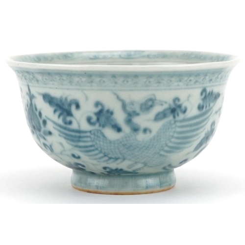 1301 - Chinese blue and white porcelain bowl hand painted with phoenixes amongst foliage, 10cm in diameter