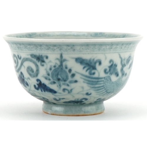 1301 - Chinese blue and white porcelain bowl hand painted with phoenixes amongst foliage, 10cm in diameter