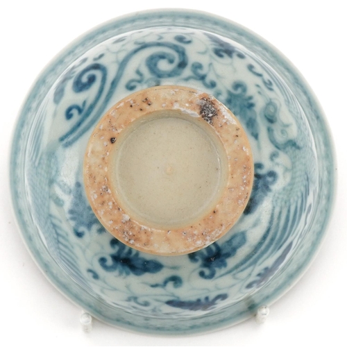 1301 - Chinese blue and white porcelain bowl hand painted with phoenixes amongst foliage, 10cm in diameter