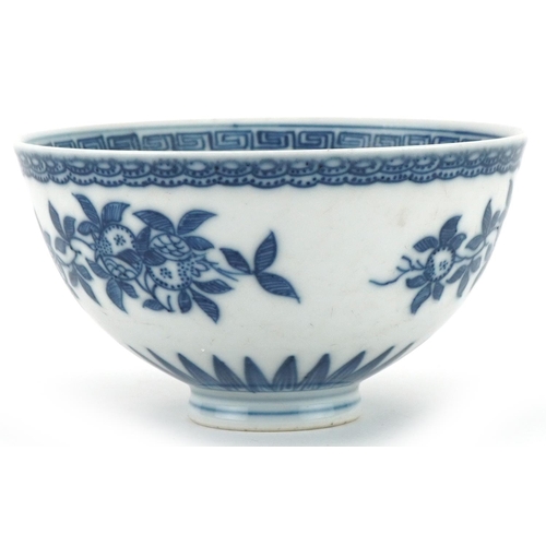 1061 - Chinese blue and white porcelain footed bowl hand painted with flowers, 10.5cm in diameter