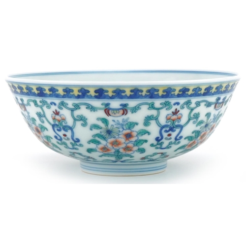 1150 - Chinese porcelain footed bowl hand painted with flowers and foliage, six figure character mark to th... 