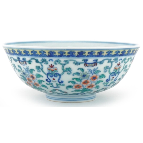 1150 - Chinese porcelain footed bowl hand painted with flowers and foliage, six figure character mark to th... 