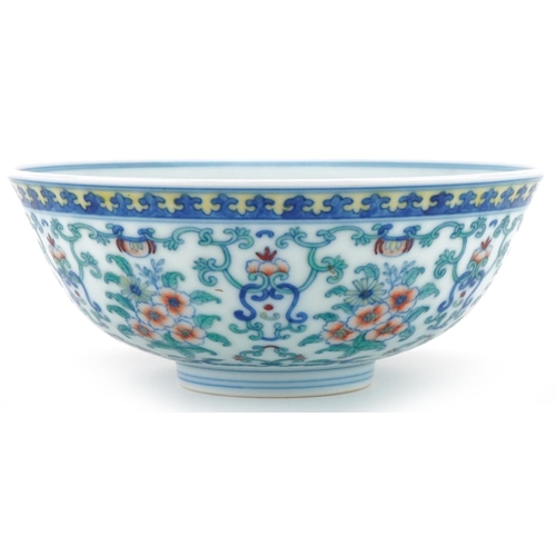 1150 - Chinese porcelain footed bowl hand painted with flowers and foliage, six figure character mark to th... 