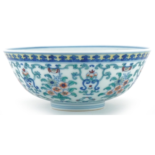 1150 - Chinese porcelain footed bowl hand painted with flowers and foliage, six figure character mark to th... 