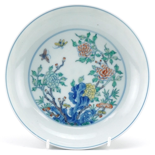 1062 - Chinese porcelain shallow dish hand painted with butterflies amongst flowers, six figure character m... 