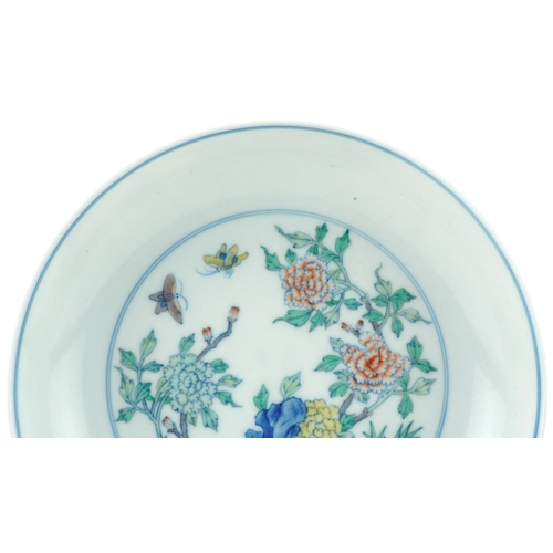 1062 - Chinese porcelain shallow dish hand painted with butterflies amongst flowers, six figure character m... 