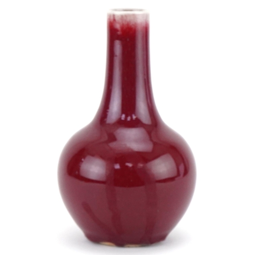 1065 - Chinese sang de boeuf porcelain bottleneck vase, 18cm high