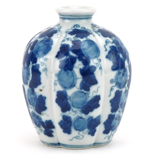 1064 - Chinese blue and white porcelain vase hand painted with fruit on vines, four figure character mark t... 