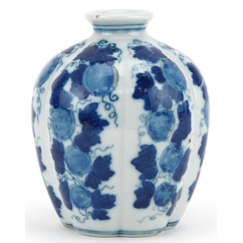 1064 - Chinese blue and white porcelain vase hand painted with fruit on vines, four figure character mark t... 