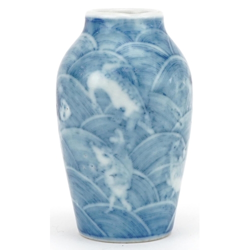 1107 - Chinese blue and white porcelain miniature vase hand painted with fish amongst waves, six figure cha... 