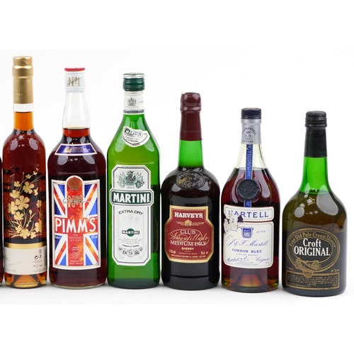 2080 - Twelve bottles of alcohol including Harvey's Medium Dry sherry, Croft Original sherry, Pimm's and Ma... 