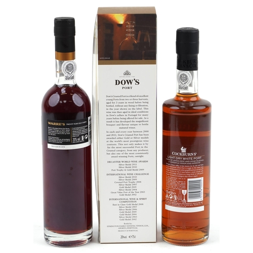 2022 - Three bottles of port comprising Warre's Otima 20 Year Old, Cockburn's and Dow's Crusted port