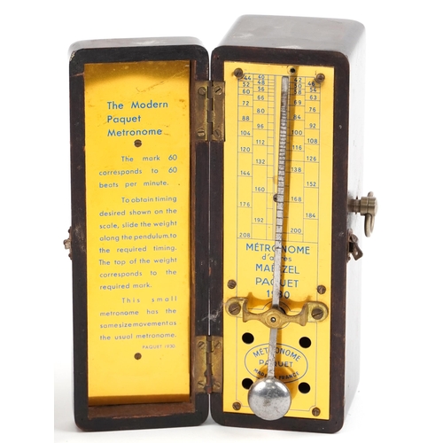 1454 - Two music interest metronomes by Wittner & Paquet, the largest 21cm high