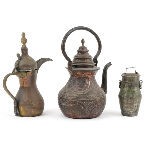 1336 - Middle Eastern metalware including Omani dallah coffee pot and large copper kettle, 34cm high