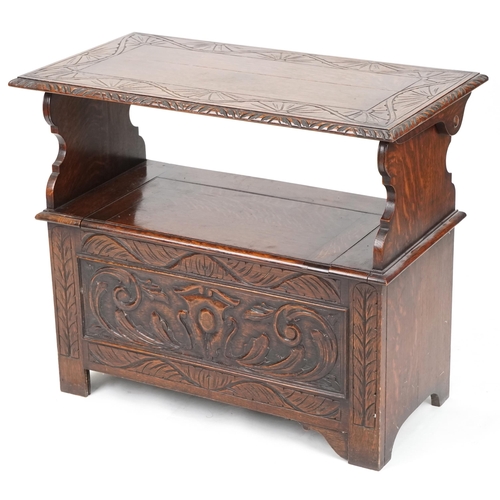 665 - Late Victorian oak monk's bench, the box seat above a carved panel front, 74cm H x 87cm W x 43cm D