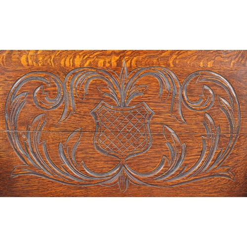 665 - Late Victorian oak monk's bench, the box seat above a carved panel front, 74cm H x 87cm W x 43cm D