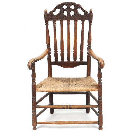 693 - 19th century oak scroll arm country chair with rush seat, 120cm H x 73cm W x 44cm D