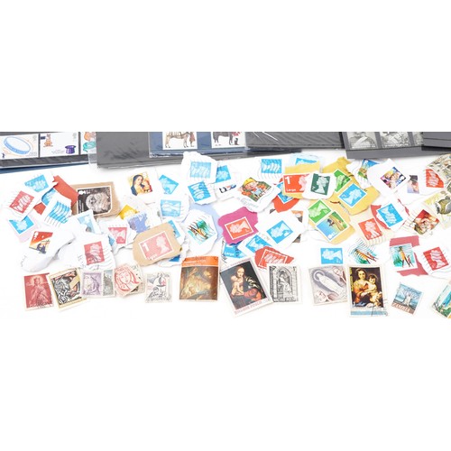 2498 - Quantity of British stamps on display cards, mainly postage, approximately one hundred and fifty to ... 