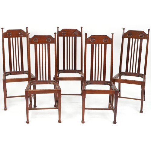 590 - Set of five early 20th century Arts & Crafts style mahogany dining chairs lacking drop in seats