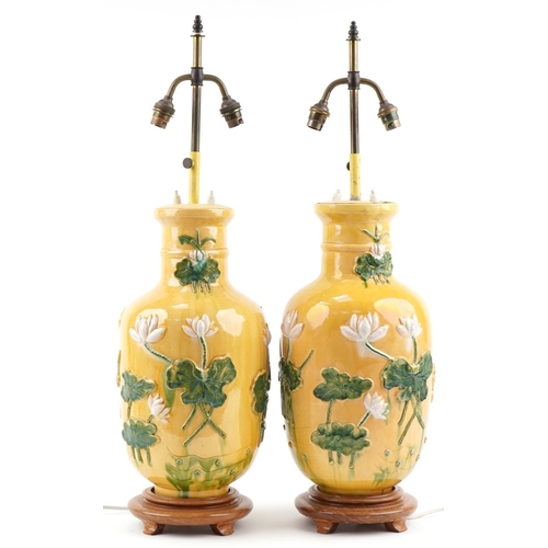 2170A - Pair of Chinese porcelain vase table lamps relief decorated with waterlilies, each overall 77cm high