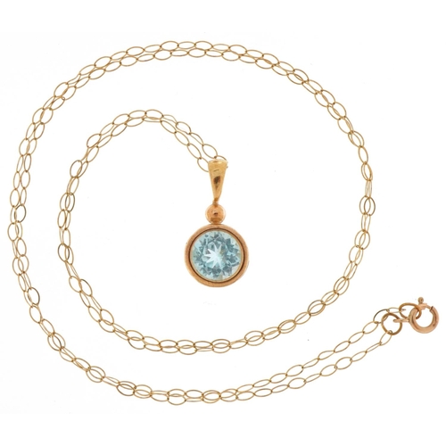 3166 - Unmarked gold blue topaz solitaire pendant on a 9ct gold necklace, the topaz approximately 6.50mm in... 