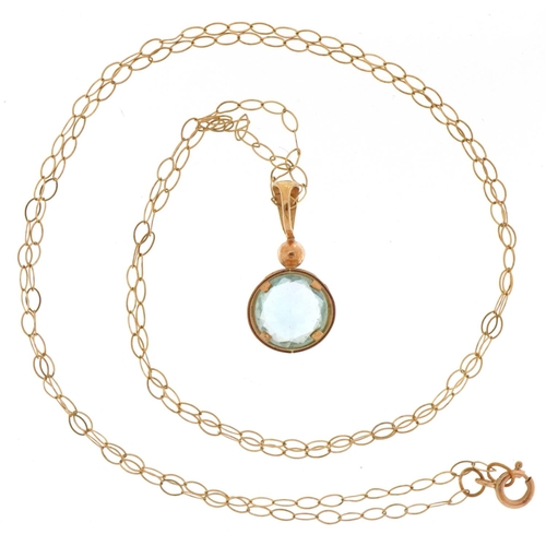 3166 - Unmarked gold blue topaz solitaire pendant on a 9ct gold necklace, the topaz approximately 6.50mm in... 