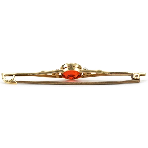 3022 - 15ct gold orange stone and cultured pearl bar brooch, 6cm wide, 2.9g