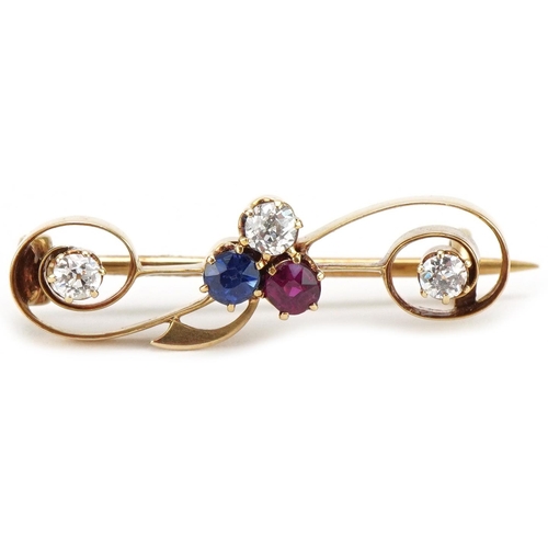 15ct gold brooch set with three diamonds, sapphire and ruby, each stone approximately 2.50mm in diameter, 3cm wide, 3.0g