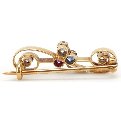 3032 - 15ct gold brooch set with three diamonds, sapphire and ruby, each stone approximately 2.50mm in diam... 