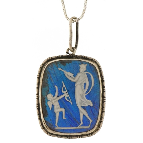 3506 - Silver butterfly wing pendant on a silver necklace decorated with Cupid, 2.5cm high and 44cm in leng... 