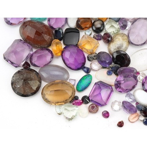 3547 - Large collection of loose semi precious stones including amethyst, quartz, citrine and blue topaz, t... 