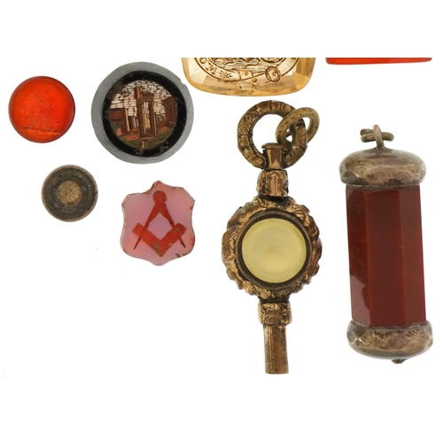 3479 - Collection of antique hardstone intaglio seals, micro mosaic panel and yellow metal watch key, the l... 