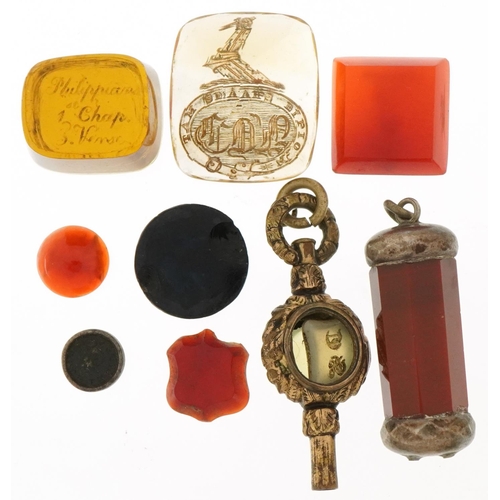 3479 - Collection of antique hardstone intaglio seals, micro mosaic panel and yellow metal watch key, the l... 