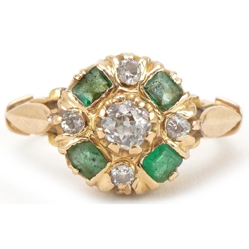 3064 - Unmarked gold diamond and emerald cluster ring, the central diamond approximately 0.30 carat, size I... 