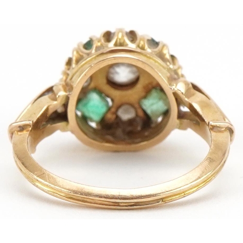 3064 - Unmarked gold diamond and emerald cluster ring, the central diamond approximately 0.30 carat, size I... 